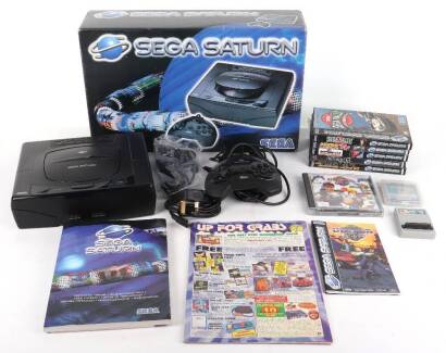 Sega Saturn boxed with 6 games.