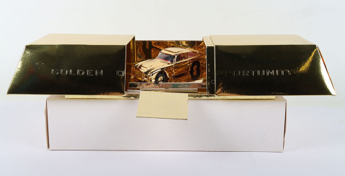 Corgi James Bond Aston Martin DB5 &lsquo;Goldfinger&rsquo; gold plated model, with gold Ingot Golden Opportunity presentation box
