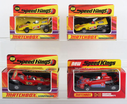 Four Matchbox Speed Kings Racing Cars