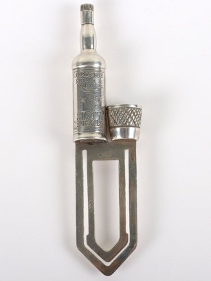 A modern silver Whiskey novelty page marker