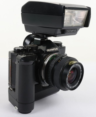 A Black Olympus OM-1 MD SLR Camera - 9