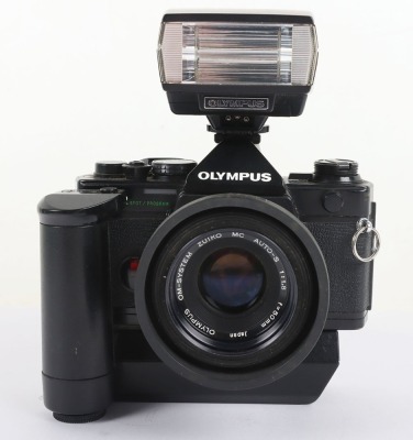 A Black Olympus OM-2 Spot/Program Camera and Lenses - 2