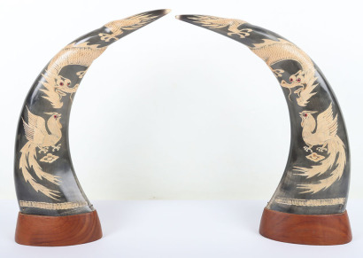 A pair of Chinese carved buffalo horns