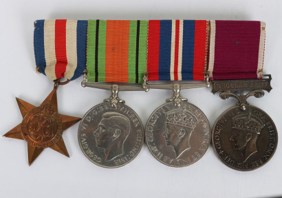 A Second World War Long Service Medal Group of Four to a Corporal of Horse in the Royal Horse Guards