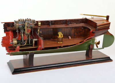 A high quality cutaway model Clinker wooden boat with twin cylinder engine