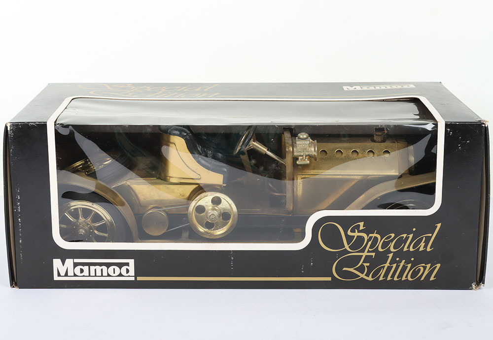 A Mamod SA1 steam roadster, comprising of white and red body of usual A Mamod SA1 steam roadster, comprising of white and red body of usual