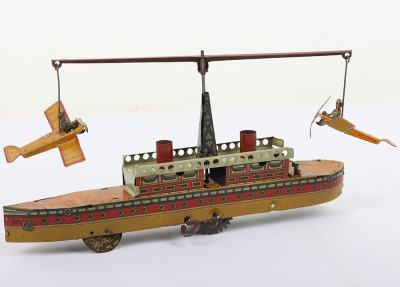 Scarce boxed CKO Kellermann clockwork tinplate ship with circling Monoplanes carpet toy 226/7, German 1920s - 3