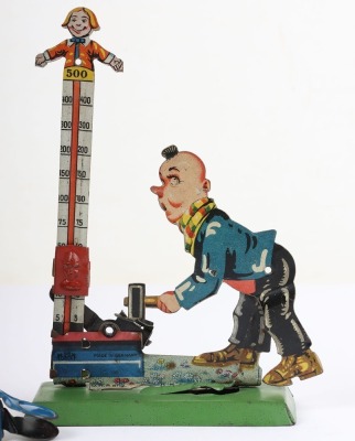 A tinplate Gely (Georg Levy) circus Strong Man High Striker novelty toy, German 1920s - 2