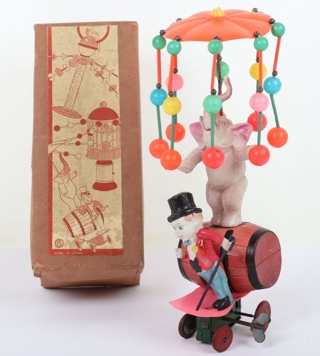 Boxed A.M Japan celluloid circus Elephant and Ringmaster clockwork novelty toy, 1930s,