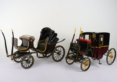 Two wooden model Victorian style carriages,