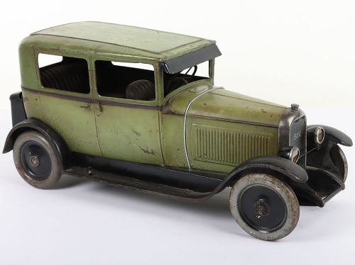 An Andre Citroen tinplate clockwork C6 4-door Saloon motor car with electric lights, French circa 1929,