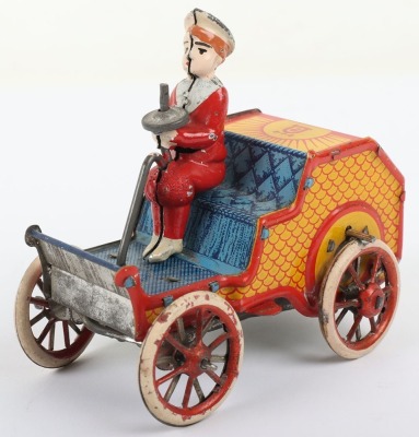 Rare Lehmann tinplate Buster Brown driving an open car, German for the U.S market circa 1910