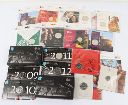 A mixture of various Brilliant Uncirculated £5, £2 and 50p, with two London 2012 £5 collections