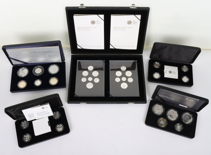 A 2008 Silver Proof set with Royal Shields and Emblems of Britain, with 2007 & 2008 Family Silver collection, with London, Edinburgh, Belfast & Cardiff silver £1, with 2014 Floral £1 four coins