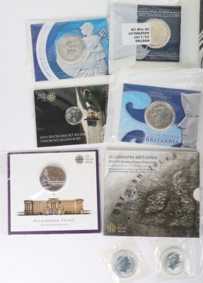 Various Silver coins including 9xBritannia coins, A Trafalgar, Big Ben and Buckingham Palace £100 .999 silver coins, with a 2015 £20 Churchill coin and Quarter ounce silver Britannia - 2