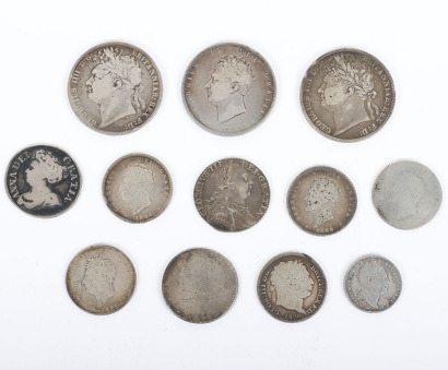 A good selection of GB coinage including a 1713 Shilling with roses and plumes, 1821, 1823 and 1825 Halfcrowns, 1787 Shilling