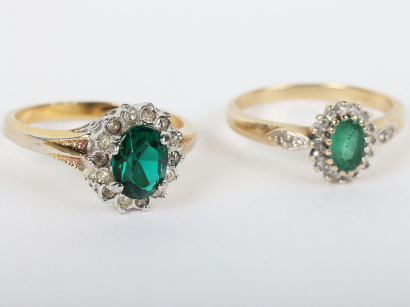 Two 9ct gold emerald and diamond rings