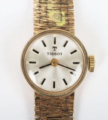 A 9ct gold Tissot ladies wristwatch and strap