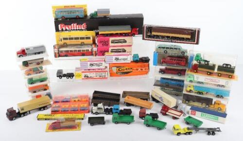 Ten Boxed Plastic Coaches and Truck models