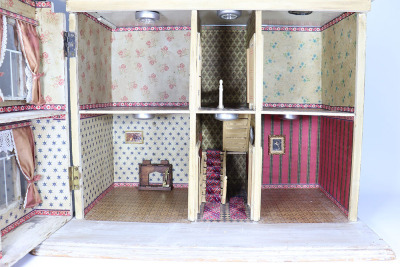 An impressive Christian Hacker painted wooden Dolls House, German 1890s, - 2