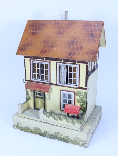 A D.H Wagner & Son painted wooden dolls house with contents, German 1920s-30s,