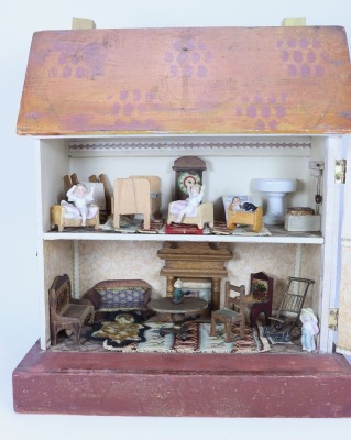 A D.H Wagner & Son painted wooden dolls house with contents, German 1920s-30s, - 2