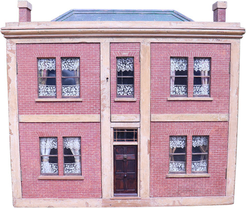 A large and impressive early English Georgian dolls house, 1803,