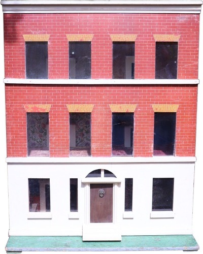 A large Silber & Fleming painted wooden dolls house on three levels, German 1890s,
