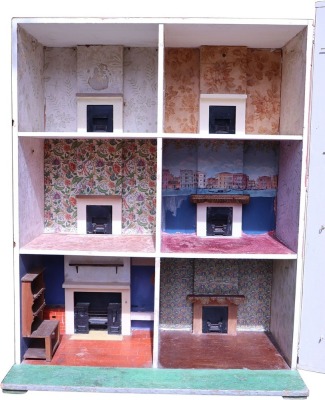 A large Silber & Fleming painted wooden dolls house on three levels, German 1890s, - 2