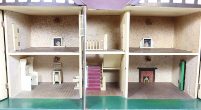 A good example of a Tri-ang No.93 large Dolls House in Tudor style, English 1930s, - 2