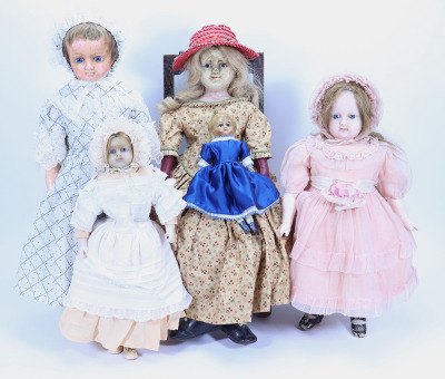 Four various wax dolls,