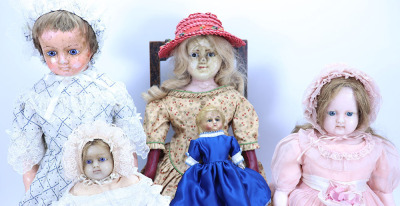 Four various wax dolls, - 2