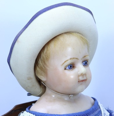 A large poured wax shoulder head doll probably Montanari, English circa 1860, - 2