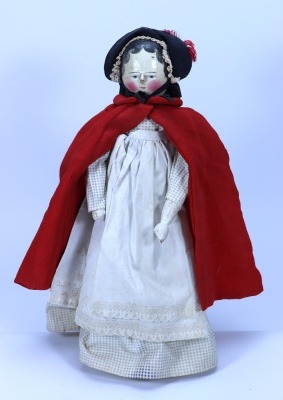 Painted wooden peg doll,