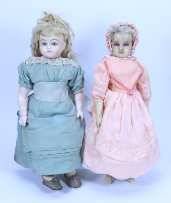 A papier-mache shoulder head doll, German circa 1870,