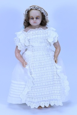 A Montanari poured wax shoulder head English doll, 1860s, - 2