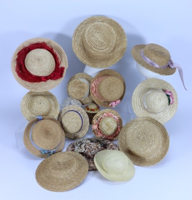 A collection of fourteen various dolls straw bonnets,