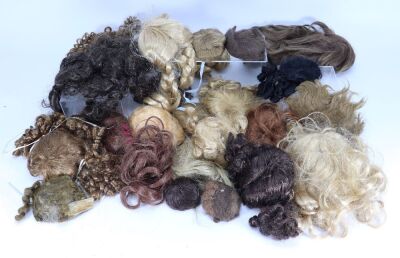 A selection of dolls and children&rsquo;s dresses, together with a good amount of doll repair items, - 2