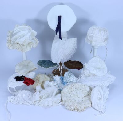 A collection of various dolls bonnets, - 2
