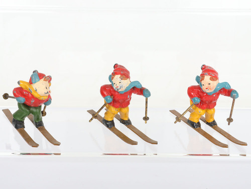 Three American lead painted Skiers