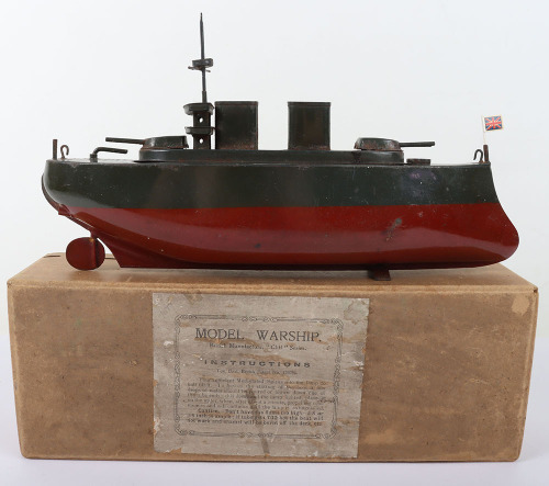 An early boxed Sutcliffe tinplate model Warship, 1920s