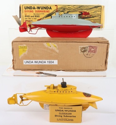 Two Sutcliffe tinplate clockwork model Unda-Wunda Diving Submarines