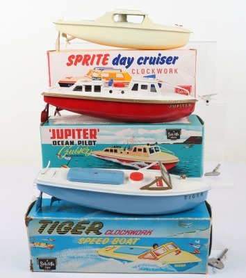 Three boxed Sutcliffe tinplate clockwork boats, circa 1970