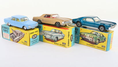 Three Boxed Vintage Corgi USA Cars