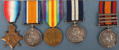 A Family Group of Medals to the Martin Family from Hastings Comprising a Great War 1917 Palestine Campaign Distinguished Service Medal Group of Four to the Royal Navy Reserve and a Related Queens South Africa Medal to a Private in the Sussex Regiment Who 