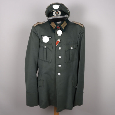WW2 German Army (Heer) Officers Combat Tunic, Peaked Cap and Steinhauer & Luck Made Knights Cross of the Iron Cross, from a Knight&rsquo;s Cross Winner with the rank of Oberstleutnant from Grenadier Regiment 481