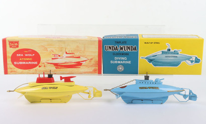 Two Boxed Sutcliffe Tinplate Submarines