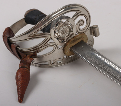 A George V 1854 Pattern Irish Guards Officers sword of Captain The Hon. Patrick J H S Ogilvy Irish Guards, Awarded the Military Cross for Gallantry in September 1916, later killed in action 1917 - 17
