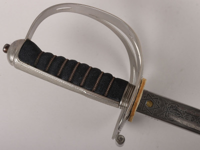 An 1854 Pattern Irish Guards Officers sword by HENRY WILKINSON PALL MALL LONDON No.54502 - 4