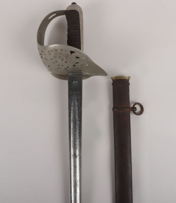 An Edward 7th 1897 Pattern Infantry Officers sword by HENRY WILKINSON PALL MALL LONDON, PATENT SOLID HILT, No.38136